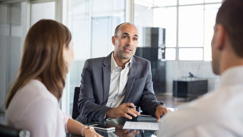 Fort Lauderdale financial planner reviewing QDRO and post-divorce financial plan with a client